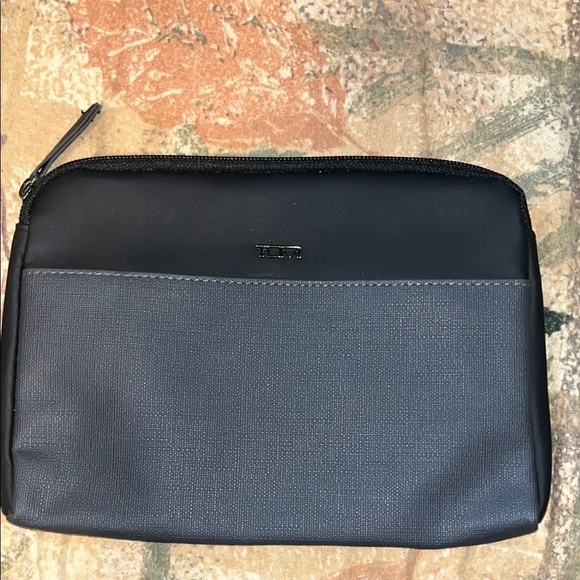 Tumi Black and Gray Toiletry Bags Sleek Durable Design - Picture 1 of 9